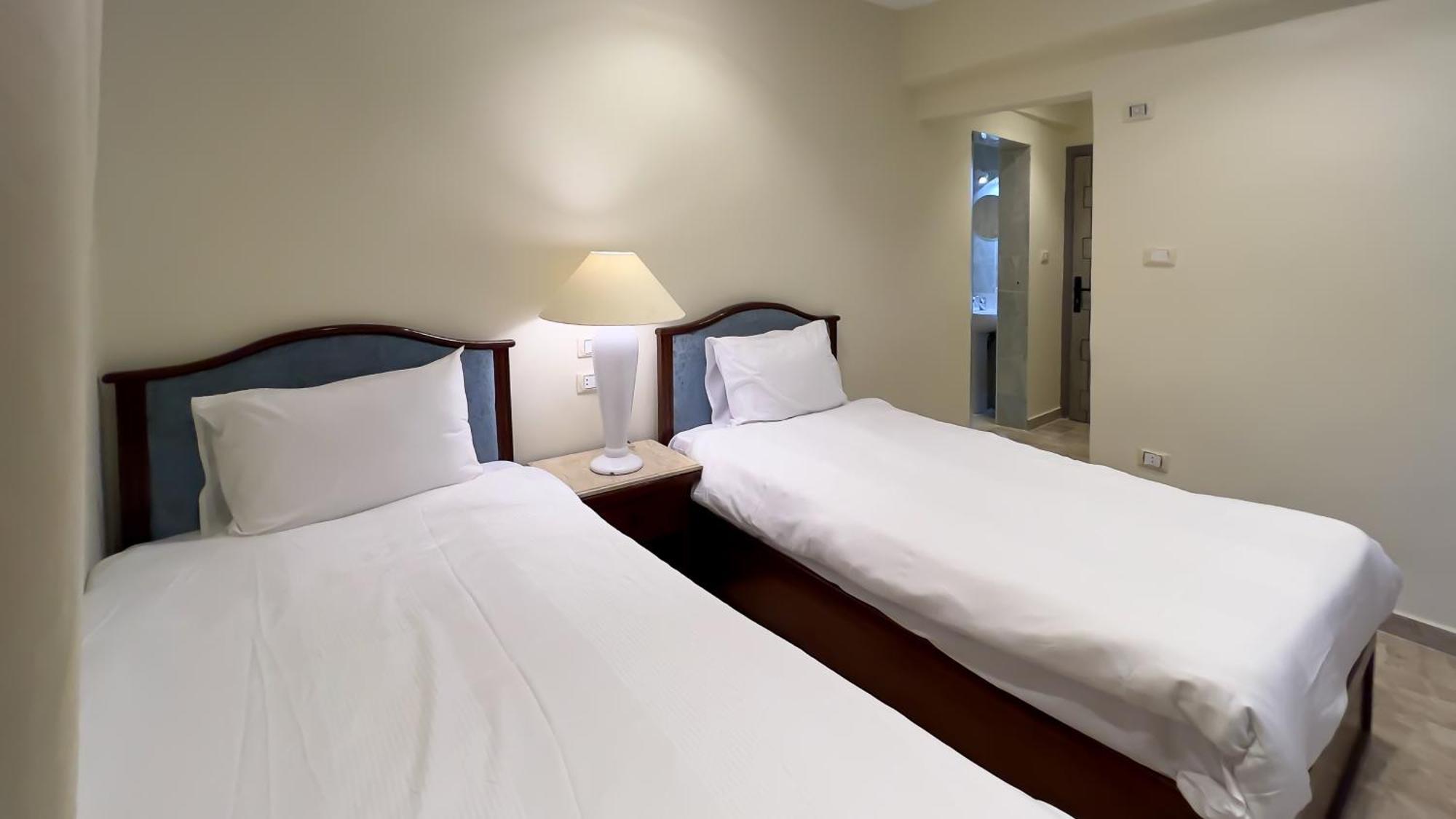 Giza Pyramids Inn Kafrat al Jabal Quarto foto